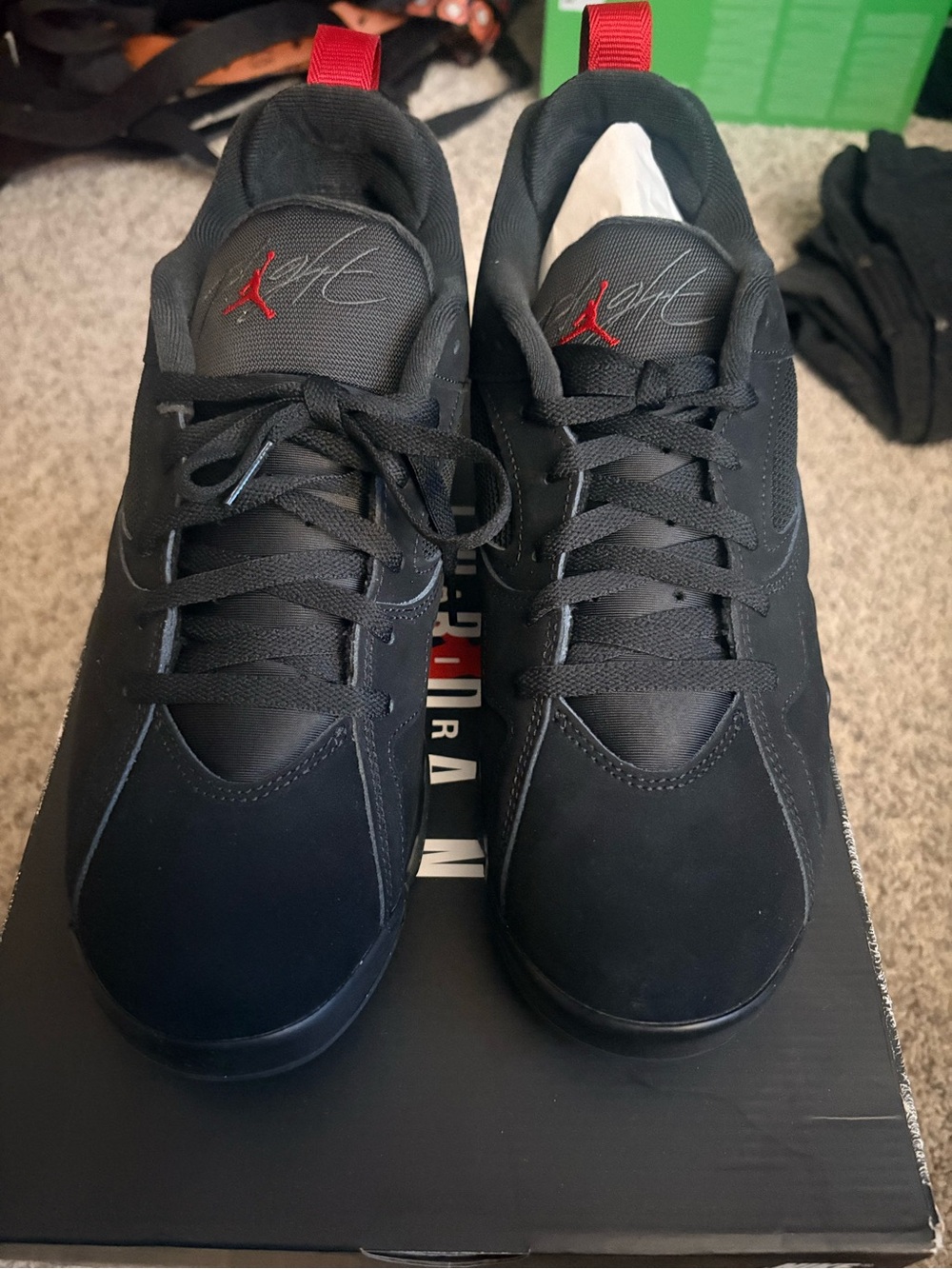 Jordan Black Low-Top Sneakers with Red Jumpman Accents